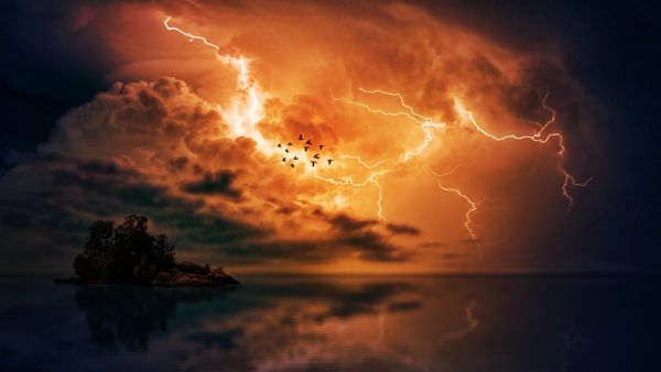 lightning and storm clouds over the ocean